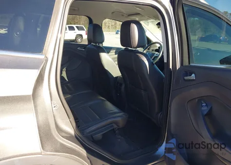 2014 Ford Escape Titanium z USA, uszkodzony, nr VIN 1FMCU0JX3EUB34011